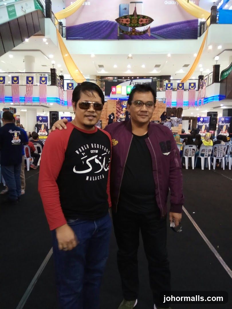 Two Men Posing in an Indoor Event