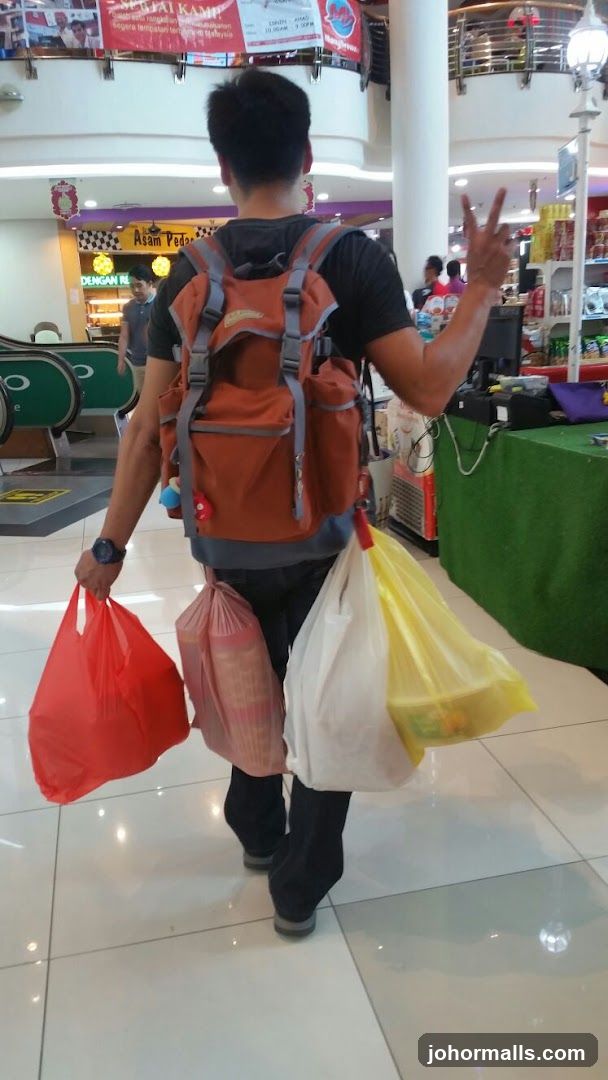 Man carrying shopping bags