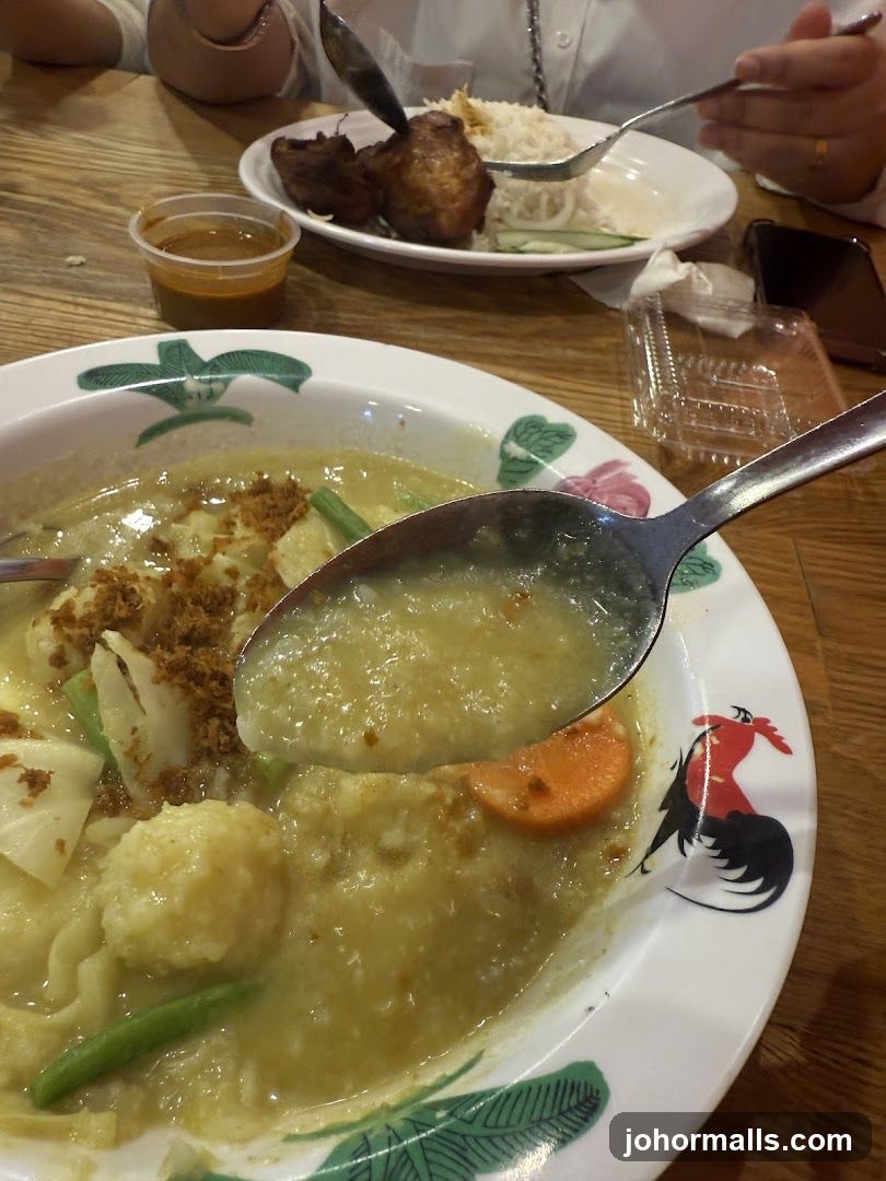 Close-up of a bowl of soup with a spoon