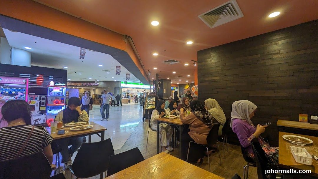 Dunkin' Donuts and other shops in a mall
