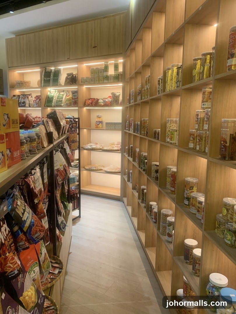 Aisle of a store with shelves stocked with food items.