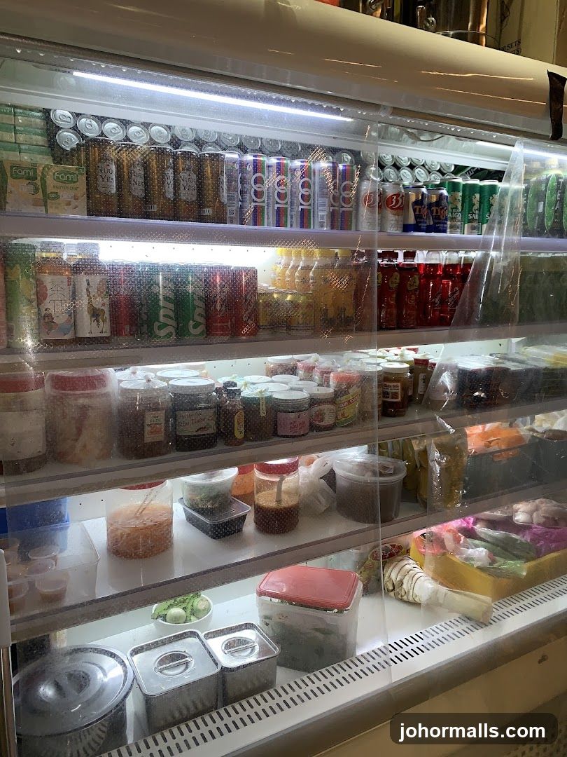 Refrigerated Display Case with Drinks and Food Items