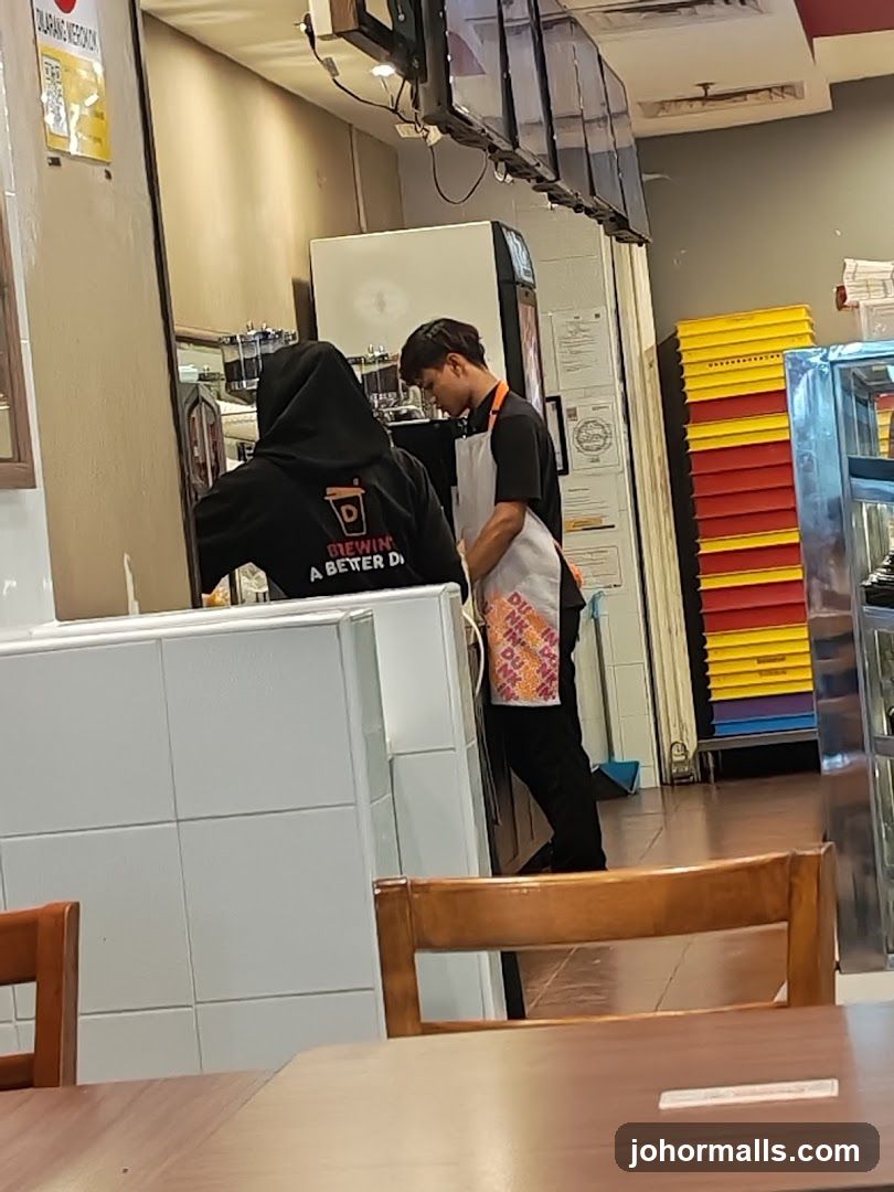 Staff preparing drinks