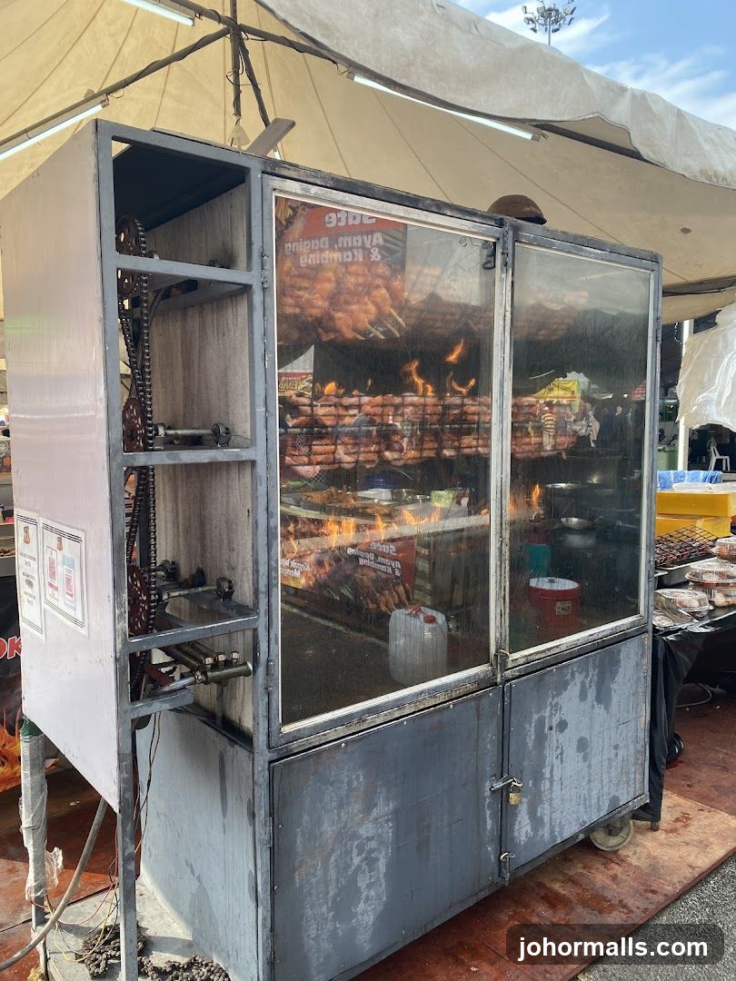 Rotisserie Grill with Meats Cooking