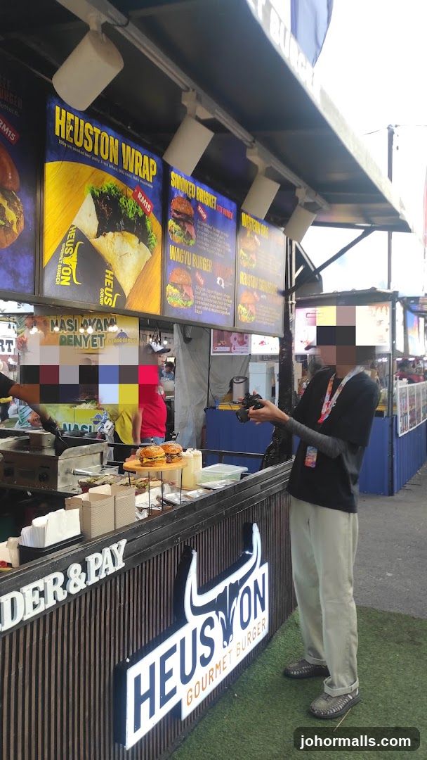 Food stall with menu and burgers