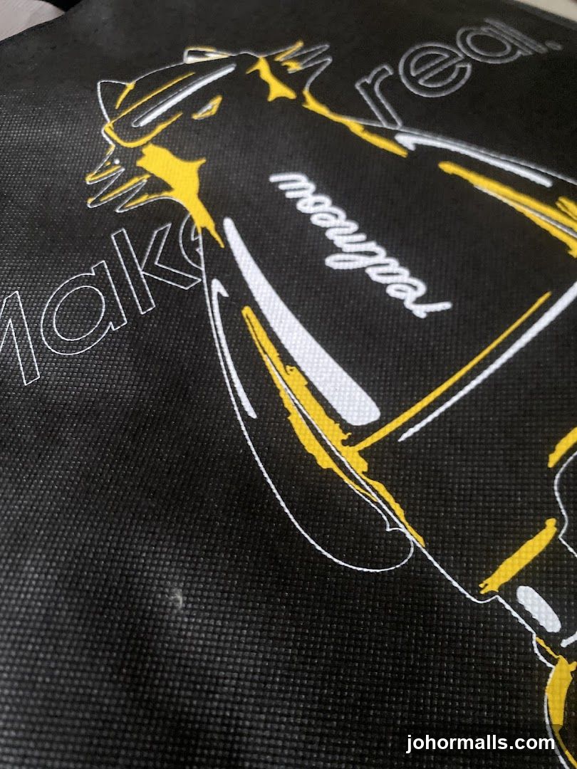 Black tote bag with graphic design