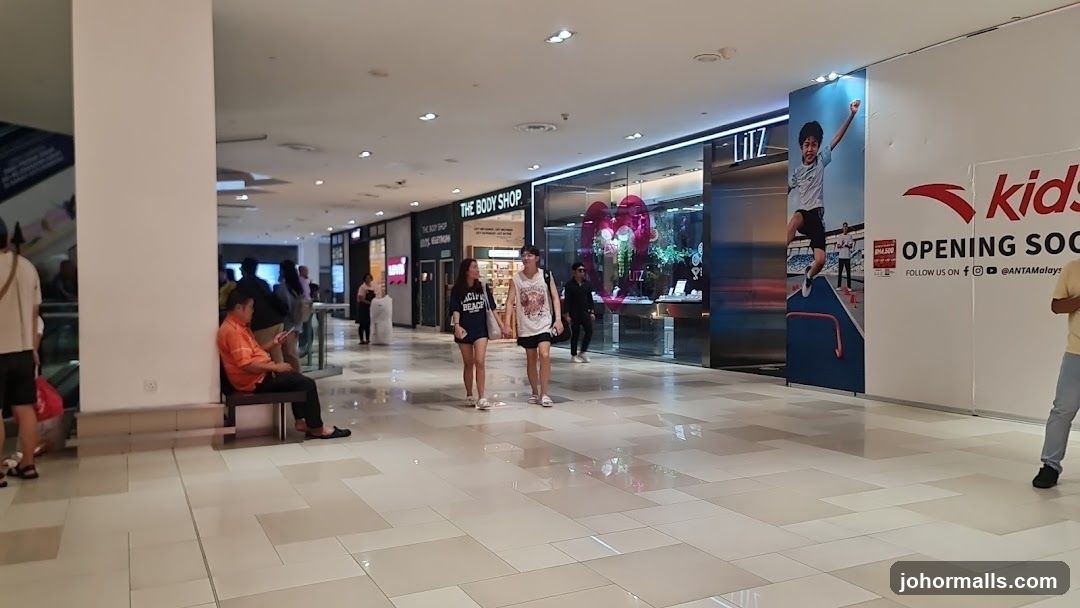 Mall Interior with Shops and Shoppers