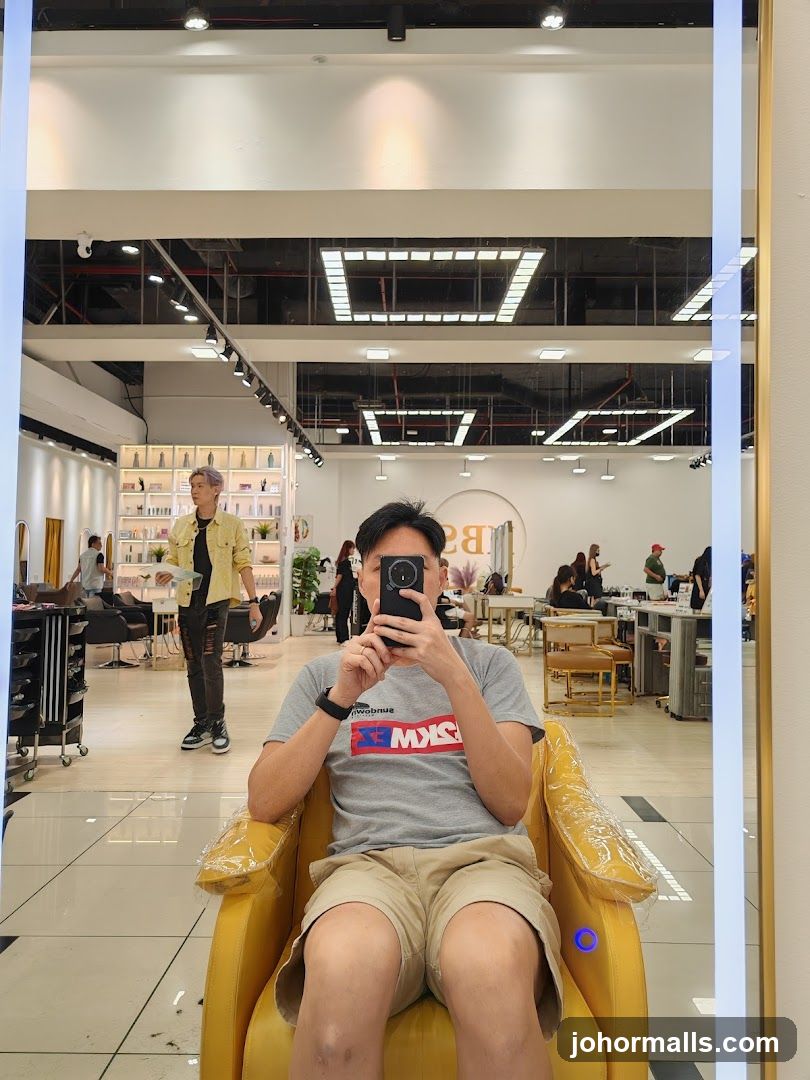 Man taking a selfie in a salon