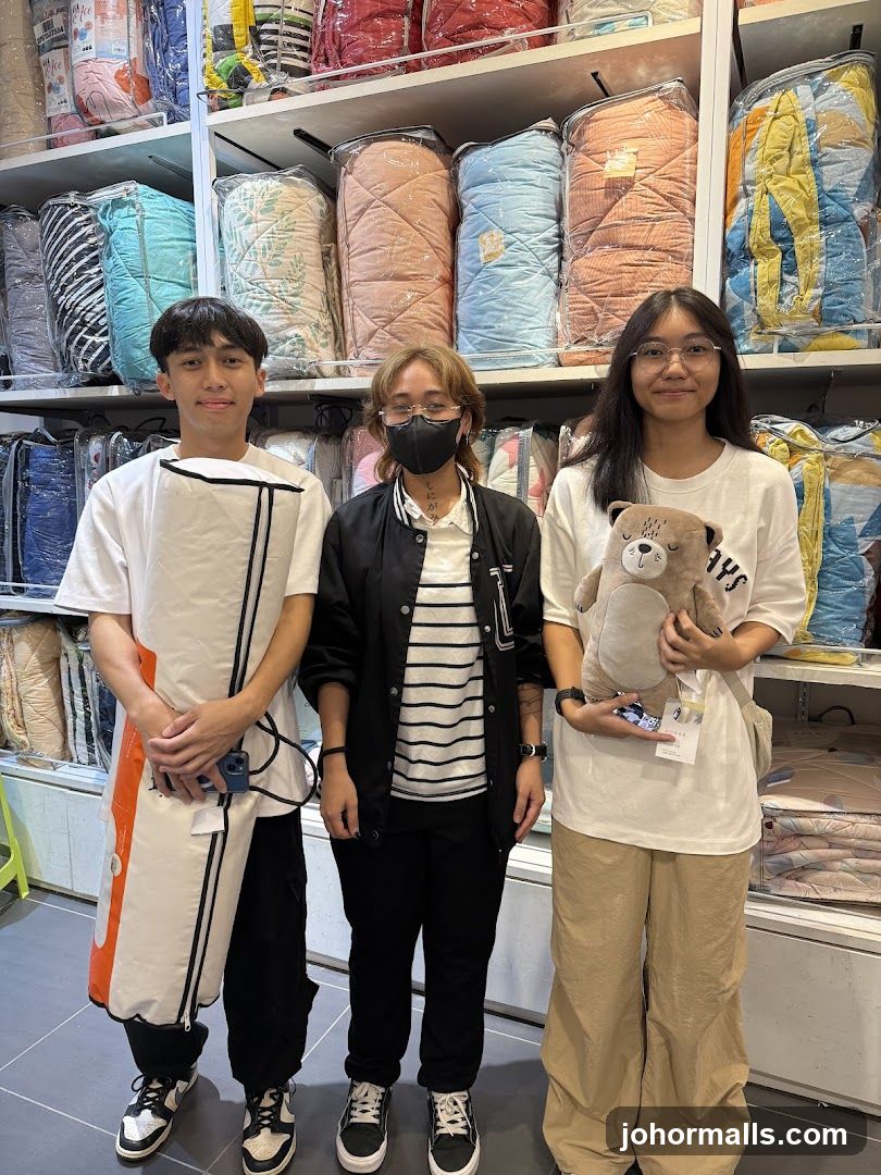People Posing in a Store with Bedding