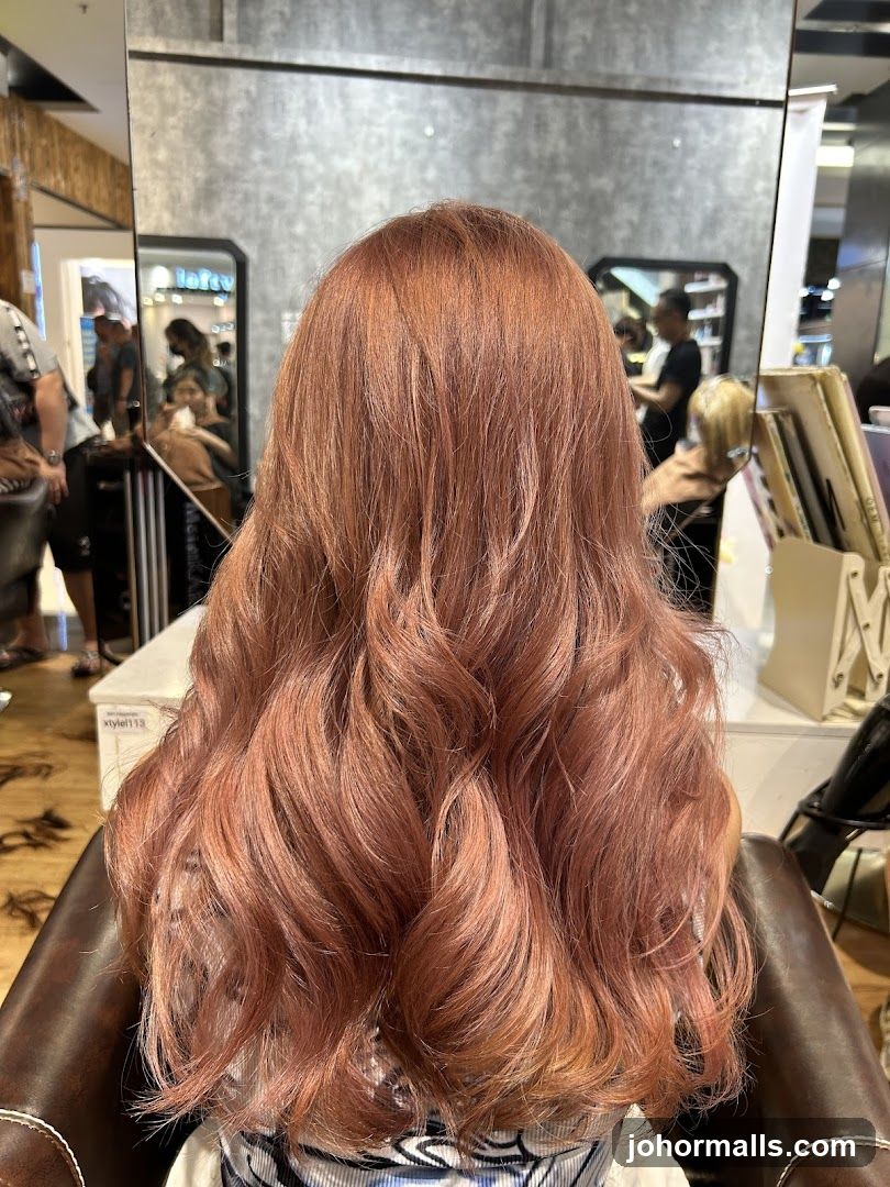 Woman with Rose Gold Hair in Salon