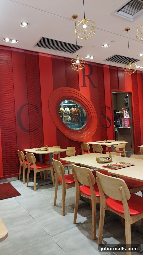 Restaurant Interior with Rotisserie Chickens