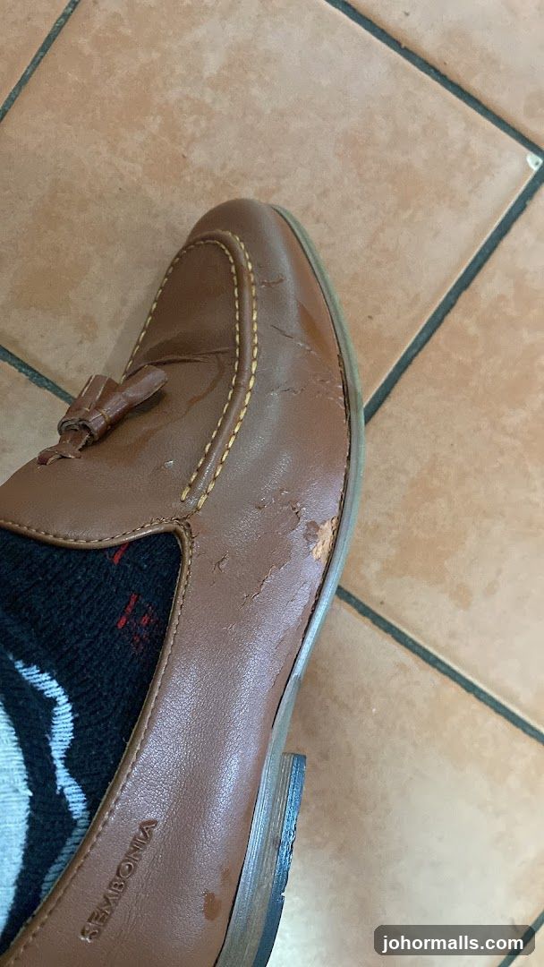 Damaged Brown Loafer