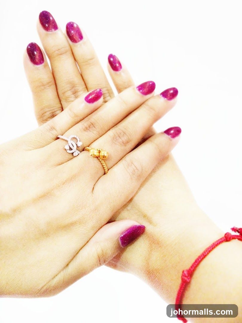 Hands with manicured nails and rings