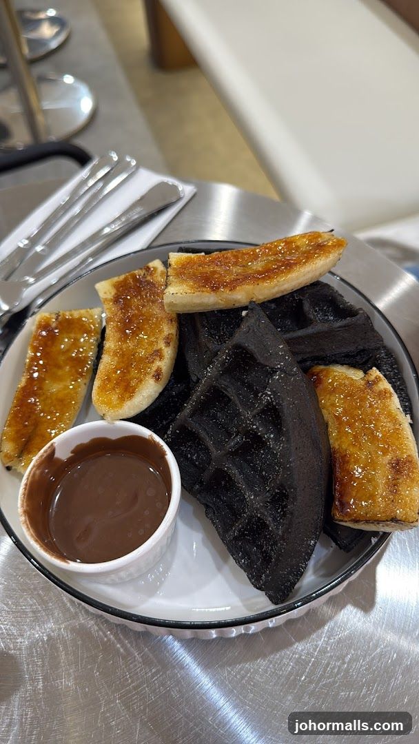Black Waffles with Caramelized Bananas and Chocolate Sauce