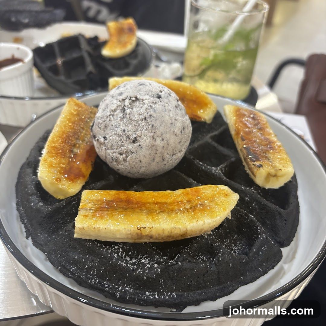 Black Waffle with Ice Cream and Bananas