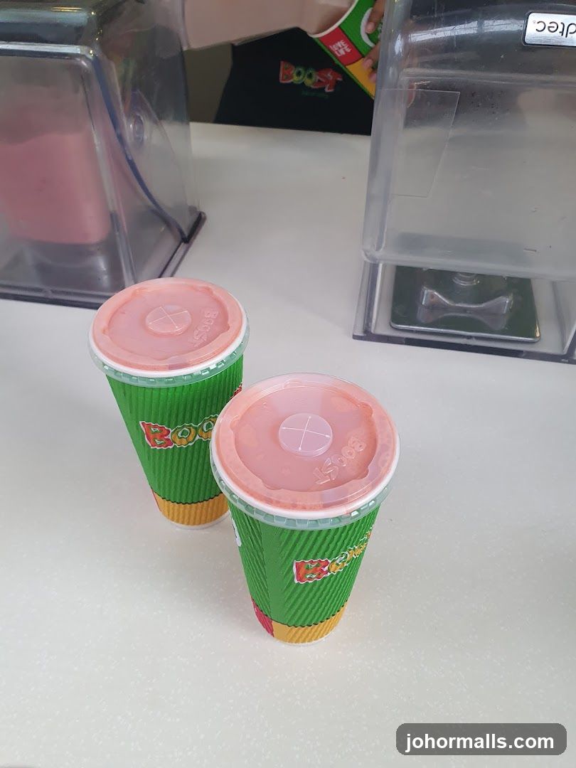 Two Boost Juice cups