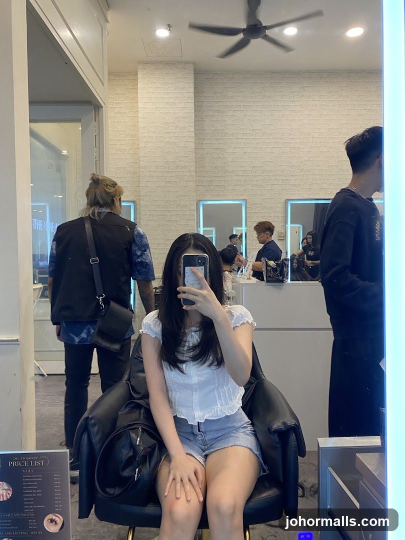 Salon Interior with Woman Taking Selfie