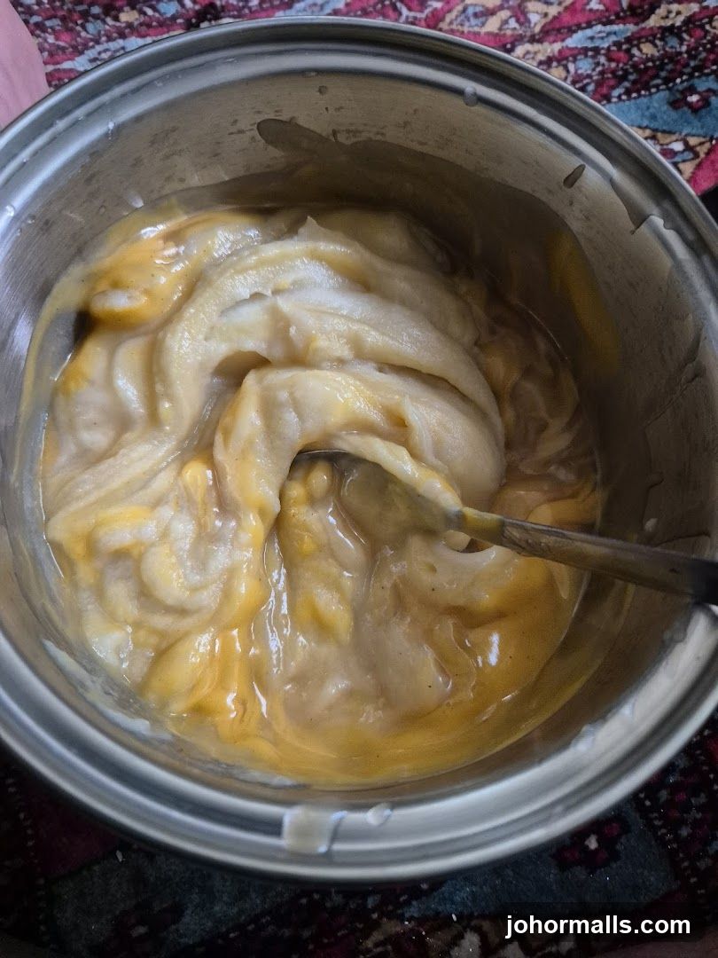 Creamy Dessert in a Metal Bowl