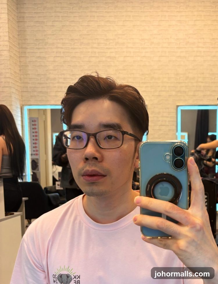 Man Taking a Selfie in a Salon