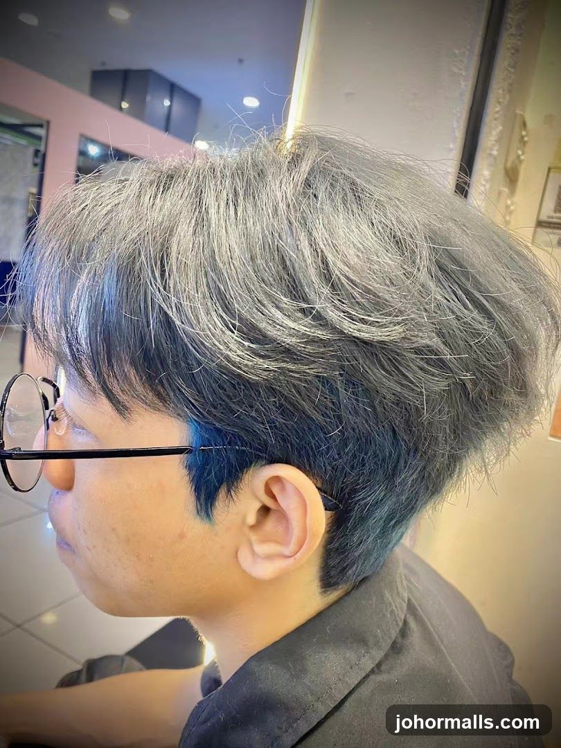Person with Blue-Tipped Hair
