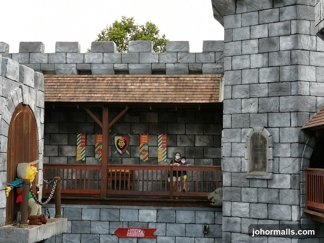 Castle Facade with Banners and Figures