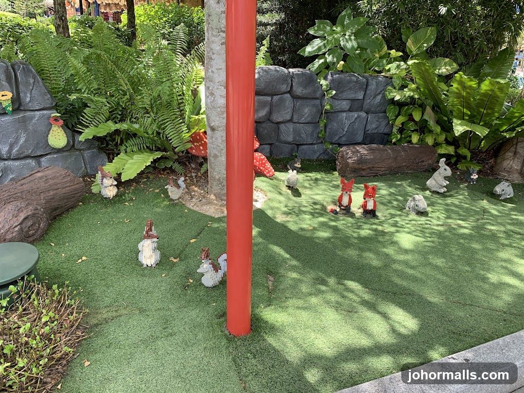 Miniature Garden Scene with Lego Figures