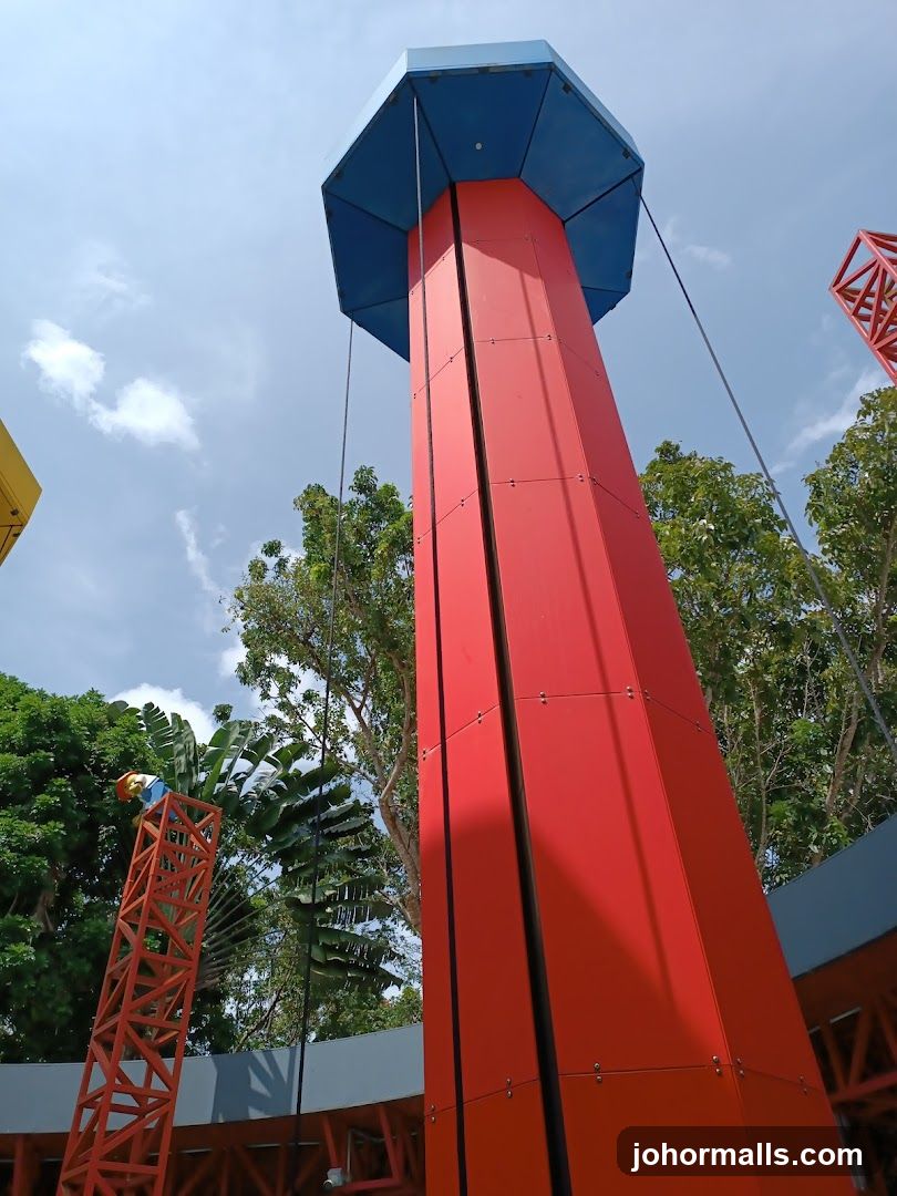 Tall Red Structure with Blue Top