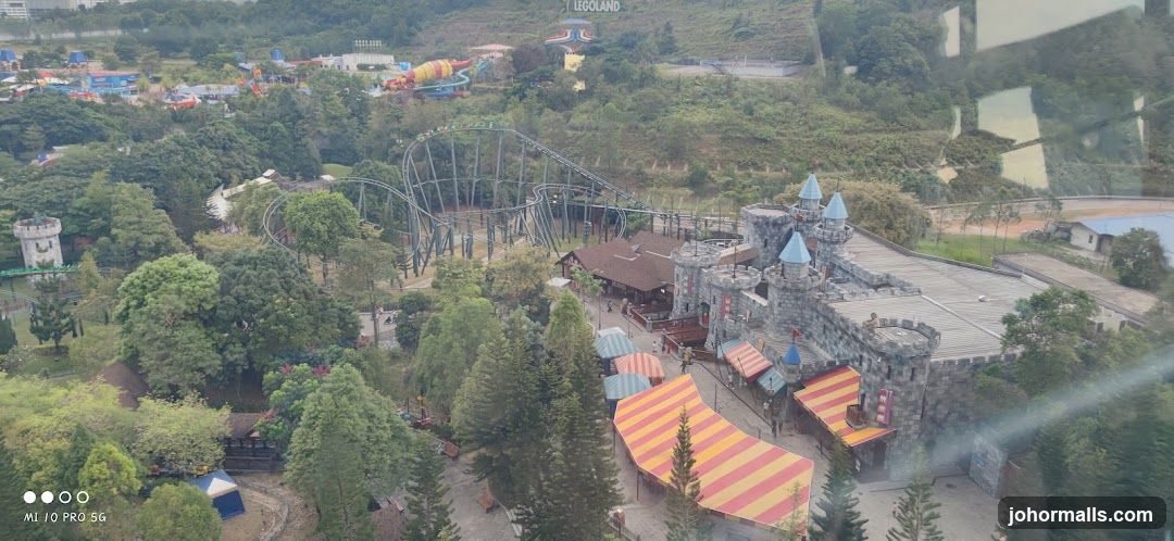 Amusement Park with Castle and Roller Coaster