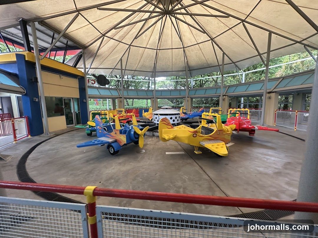 Amusement Ride with Airplane-Themed Cars