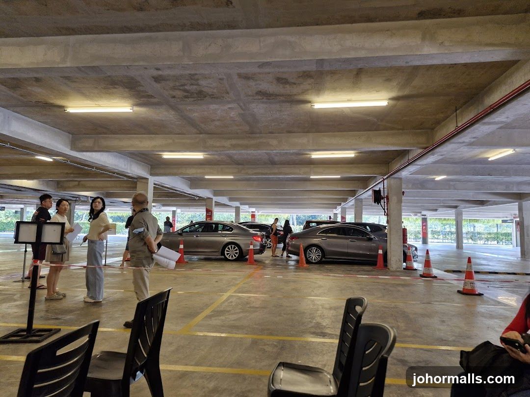 People waiting in a parking garage