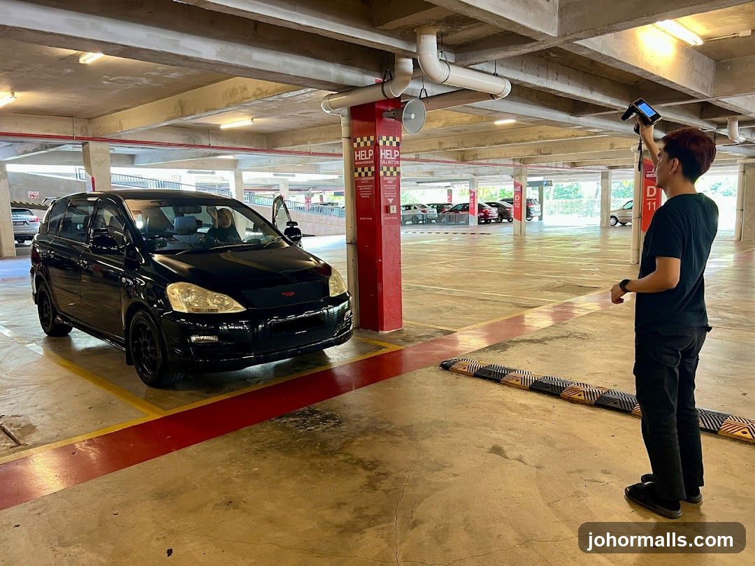 Man scanning car in parking lot