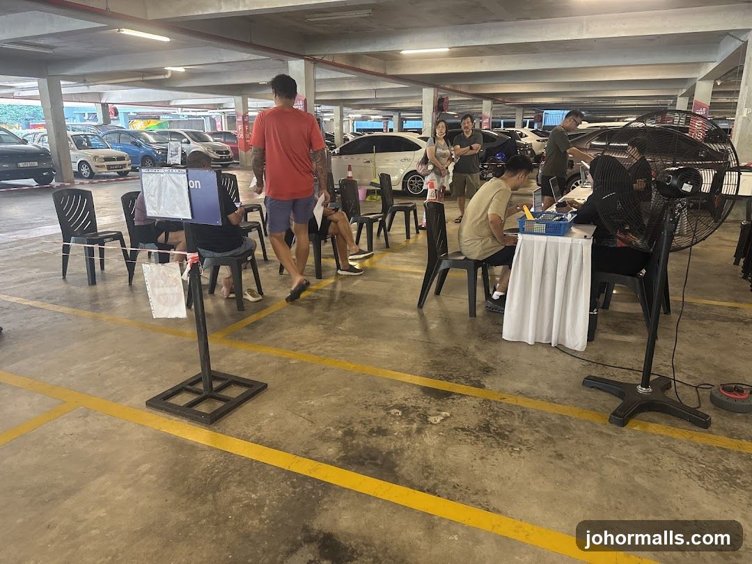 People waiting in a parking lot