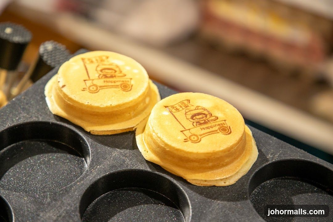 Stack of Pancakes with Cartoon Design