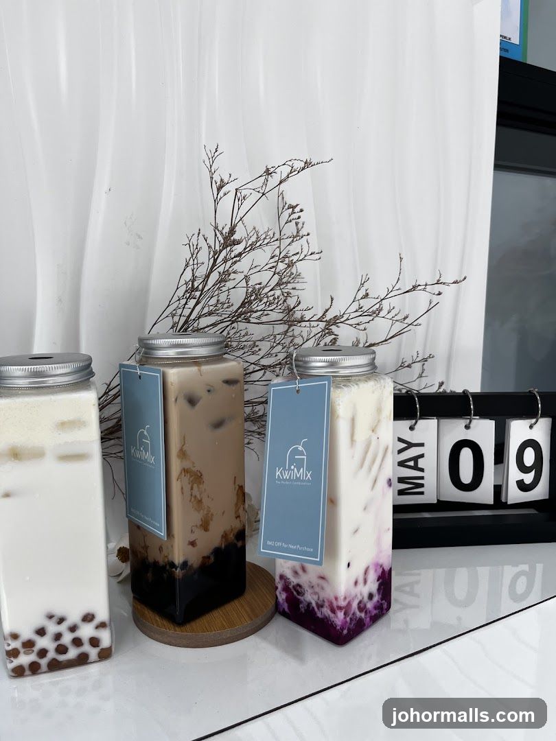 Three drinks with boba