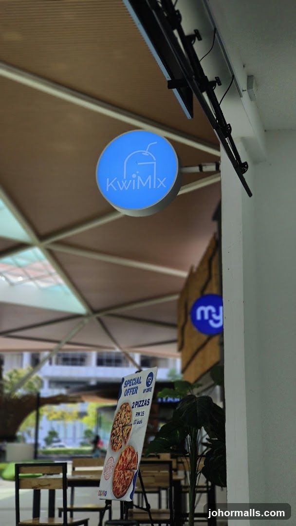 KwiMlx Sign and Pizza Offer