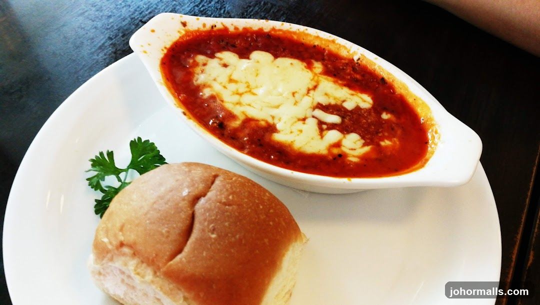 Baked Dish with Bread Roll