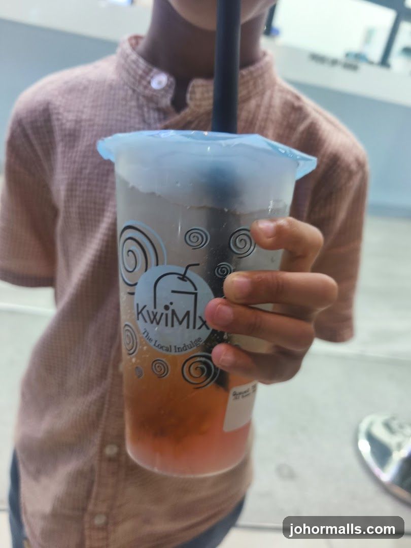 Person holding a bubble tea