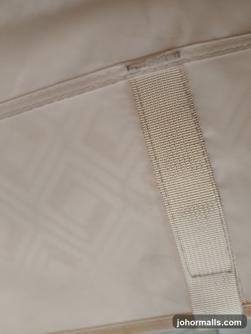 Close-up of beige fabric with strap