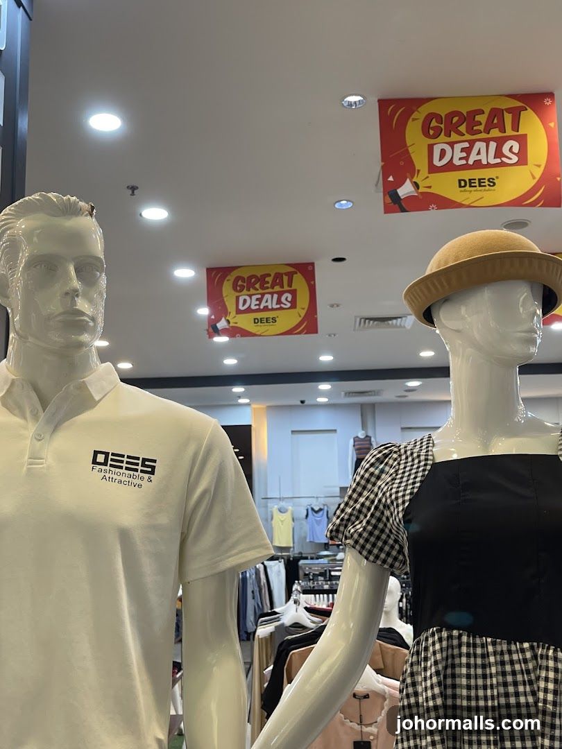 Mannequins in a store with sale signs