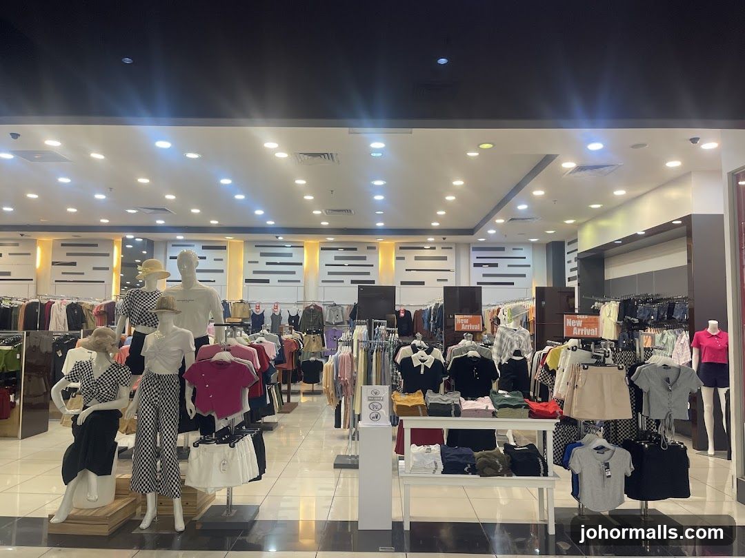Clothing store interior with mannequins and racks of clothes