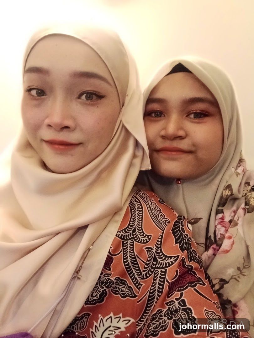 Two women wearing hijabs
