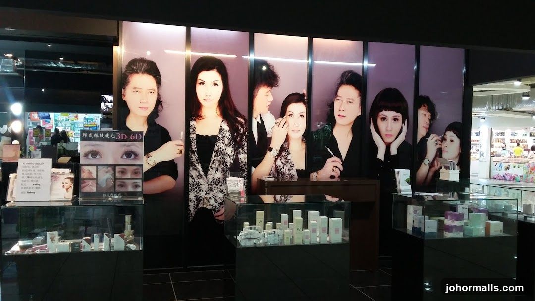 Cosmetics display with large portraits