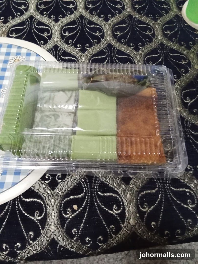 Assorted Desserts in a Plastic Container