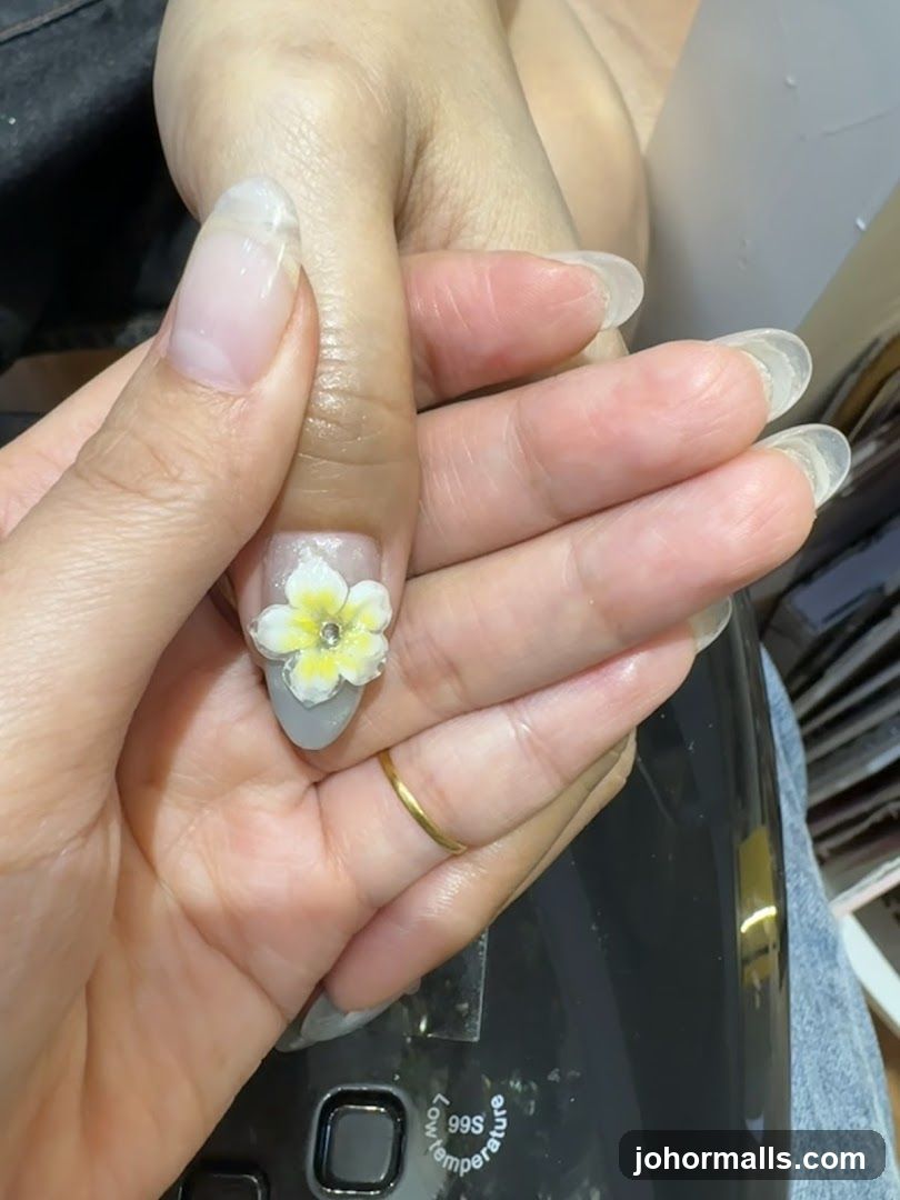 Nail Art with Flower Embellishment