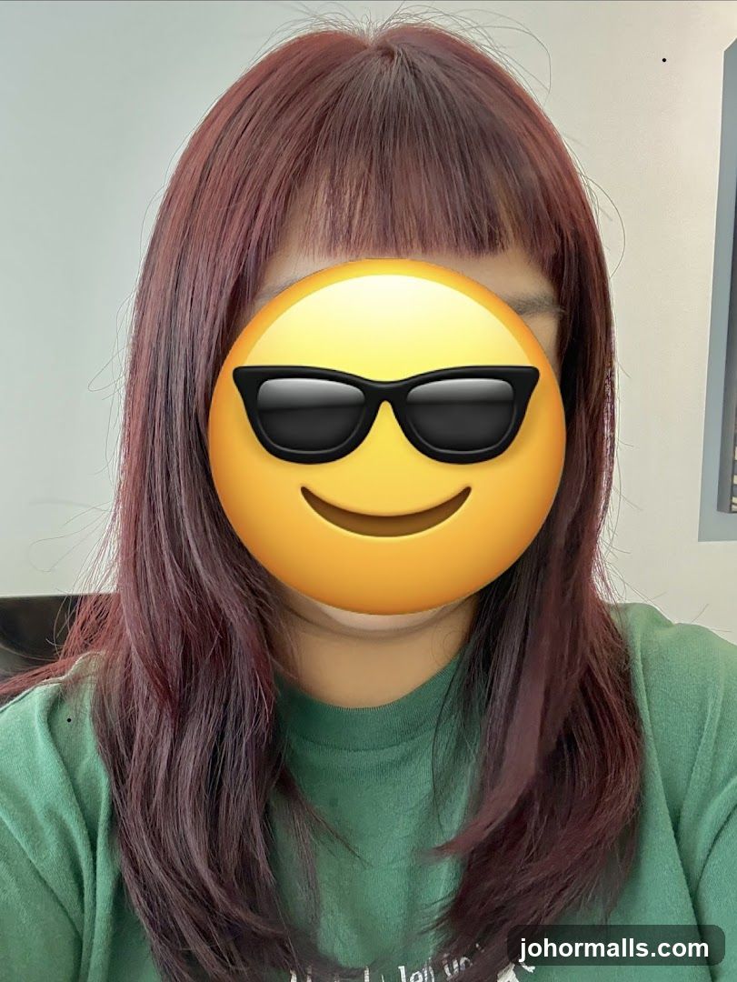 Woman with sunglasses emoji covering face