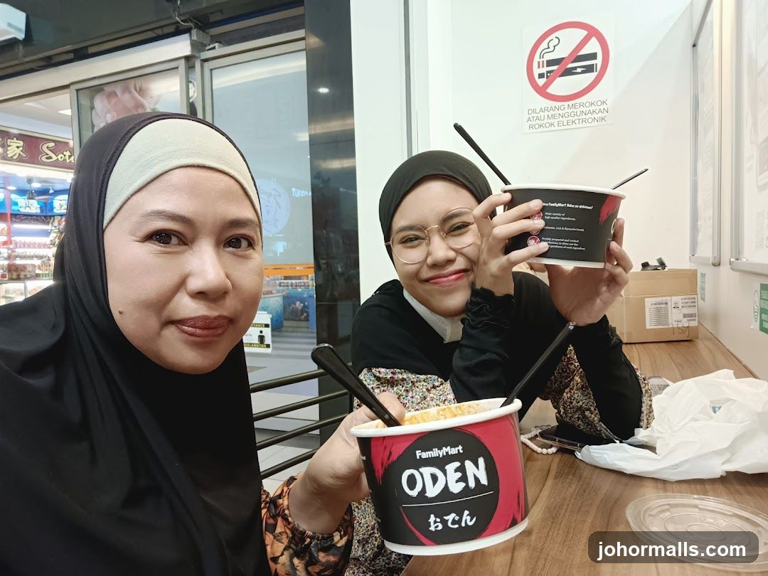 Two women enjoying oden