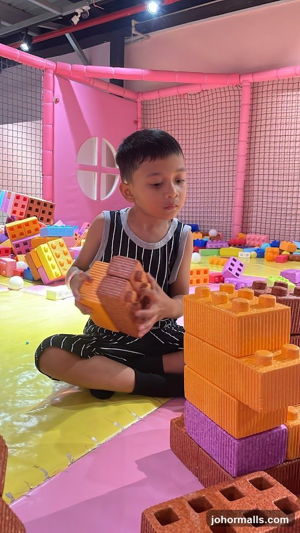 Child Playing with Building Blocks