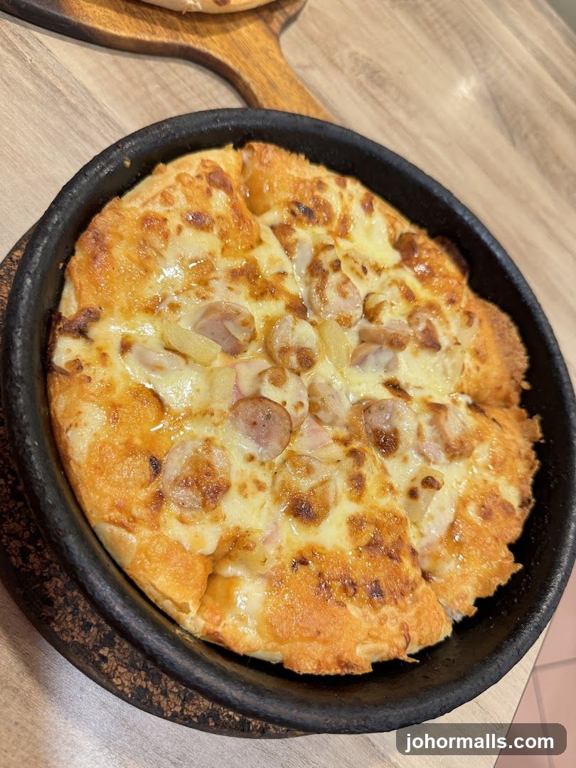 Pizza with Sausage and Pineapple