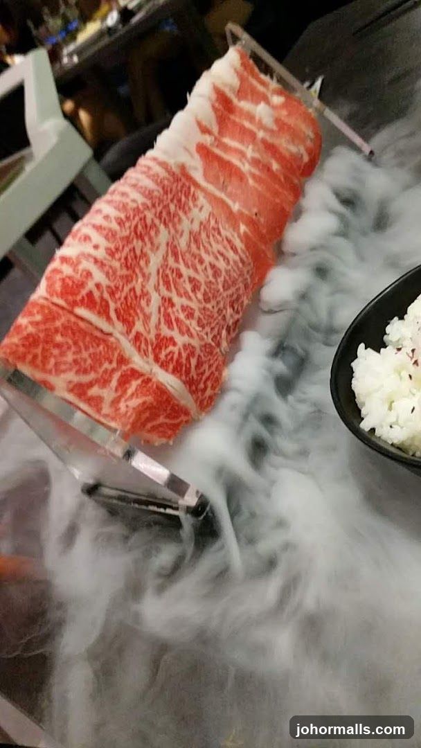 Thinly Sliced Raw Beef with Rice