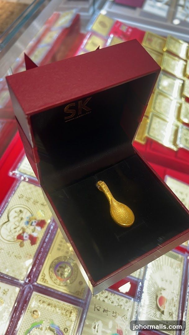 Gold Pendant in a Jewelry Box